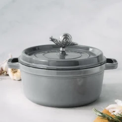 Staub Bouton, Argent New